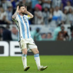 
              Argentina's Lionel Messi celebrates after scoring his side's second goal from the penalty spot during the World Cup quarterfinal soccer match between the Netherlands and Argentina, at the Lusail Stadium in Lusail, Qatar, Friday, Dec. 9, 2022. (AP Photo/Ricardo Mazalan)
            