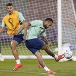 
              Brazil's Neymar, right, and Thiago Silva practice during a training session at the Grand Hamad stadium in Doha, Qatar, Sunday, Dec. 4, 2022. Brazil will face South Korea in a World Cup round of 16 soccer match on Dec. 5. (AP Photo/Andre Penner)
            