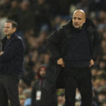 
              Manchester City's head coach Pep Guardiola, right, stands on the touchline with Everton's head coach Frank Lampard during the English Premier League soccer match between Manchester City and Everton at the Etihad Stadium in Manchester, England, Saturday, Dec. 31, 2022. (AP Photo/Dave Thompson)
            