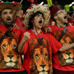 
              Soccer fans supporting Morocco cheer prior to the World Cup round of 16 soccer match between Morocco and Spain, at the Education City Stadium in Al Rayyan, Qatar, Tuesday, Dec. 6, 2022. (AP Photo/Francisco Seco)
            