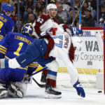 
              Colorado Avalanche left wing J.T. Compher (37) celebrates a goal by left wing Artturi Lehkonen (62) during the second period of the team's NHL hockey game against the Buffalo Sabres, Thursday, Dec. 1, 2022, in Buffalo, N.Y. (AP Photo/Jeffrey T. Barnes)
            