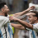 
              Argentina's Julian Alvarez, right, and Lionel Messi, left, celebrate their side's second goal during the World Cup round of 16 soccer match between Argentina and Australia at the Ahmad Bin Ali Stadium in Doha, Qatar, Saturday, Dec. 3, 2022. (AP Photo/Frank Augstein)
            