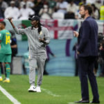 
              Senegal's head coach Aliou Cisse and England's head coach Gareth Southgate, right, stand by the touchline during the World Cup round of 16 soccer match between England and Senegal, at the Al Bayt Stadium in Al Khor, Qatar, Sunday, Dec. 4, 2022. (AP Photo/Manu Fernandez)
            