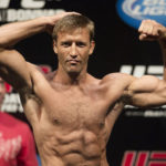 
              FILE - Mixed martial arts fighter Stephan Bonnar, of the United States, poses during the Ultimate Fighting Championship (UFC) 153 weigh-in event in Rio de Janeiro,  Oct. 12, 2012. UFC says former fighter Bonnar, who played a significant role in the UFC’s growth into the dominant promotion in mixed martial arts, has died. The UFC Hall of Famer was 45. UFC announced in a statement that Bonnar died Thursday, Dec. 22, 2022, from “presumed heart complications while at work.” (AP Photo/Felipe Dana, File)
            