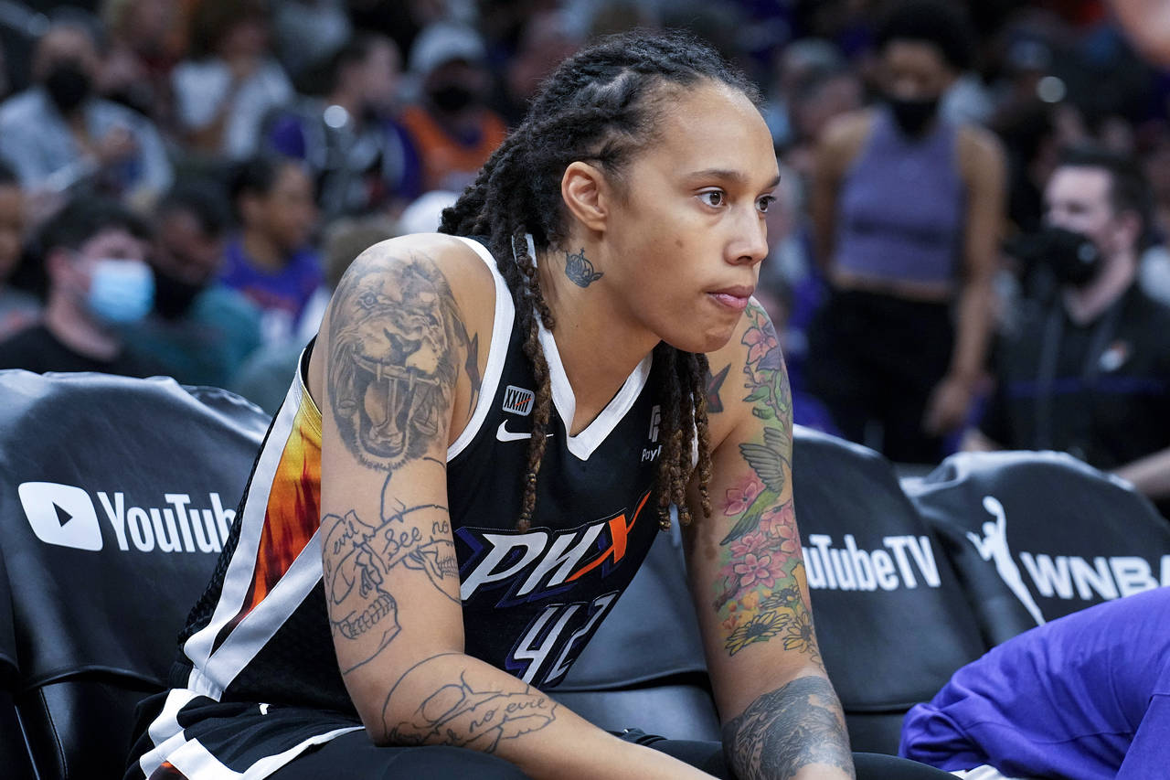 FILE - Phoenix Mercury center Brittney Griner sits during the first half of Game 2 of basketball's ...