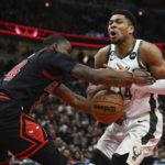 
              Milwaukee Bucks' Giannis Antetokounmpo (34) is fouled by Chicago Bulls' Javonte Green (24) during the second half of an NBA basketball game Wednesday, Dec. 28, 2022, in Chicago. (AP Photo/Quinn Harris)
            
