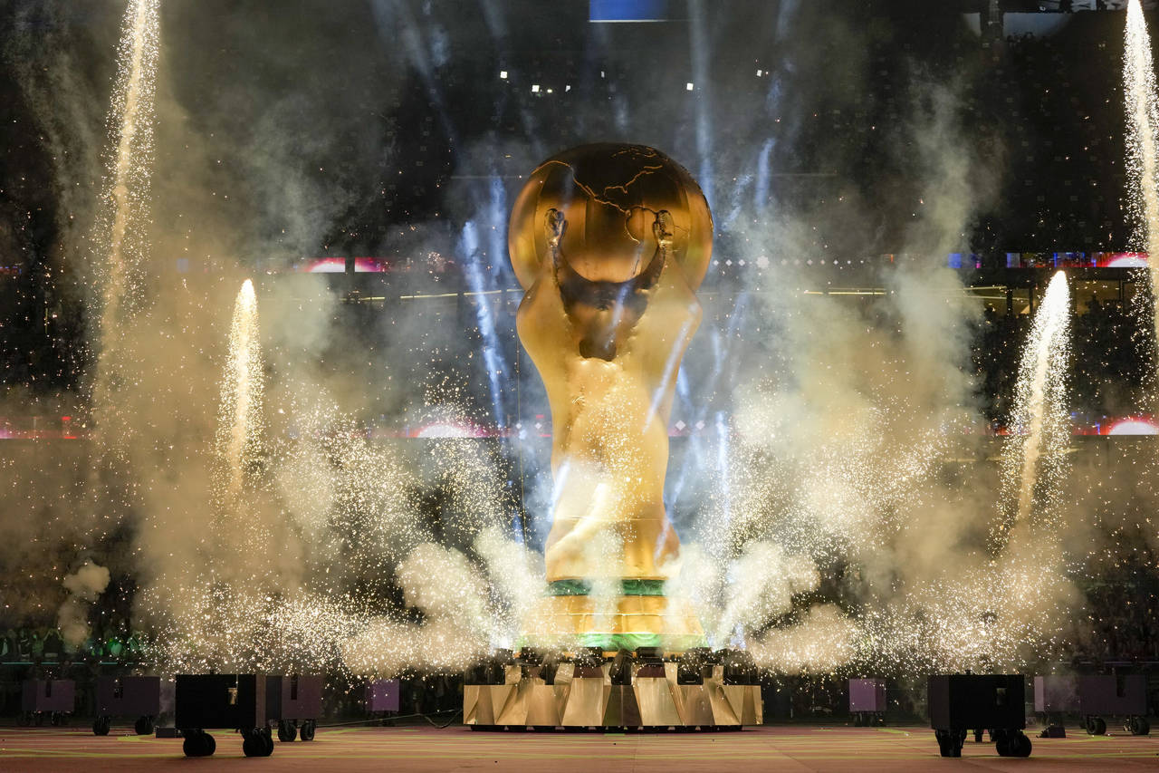 The World Cup trophy replica is shown during the opening ceremony in the World Cup quarterfinal soc...