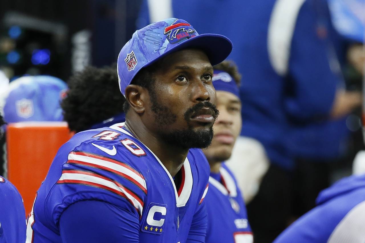 FILE - Buffalo Bills' Von Miller watches from the bench during the second half of an NFL football g...