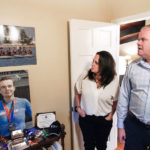 
              Brenda and Brian Lilly look at photos of their son Brian Lilly Jr. in their Easton, Conn. home, Thursday, Oct. 13, 2022. Brian Lilly Jr., 19, who committed suicide on Jan. 4, 2021, was a rower at University of California San Diego. The Lillys have filed a wrongful death lawsuit against the university and the rowing coach, Geoff Bond, who is no longer with the school. (AP Photo/Julia Nikhinson)
            