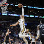 
              New Orleans Pelicans center Willy Hernangomez (9) goes to the basket in the first half of an NBA basketball game against the San Antonio Spurs in New Orleans, Thursday, Dec. 22, 2022. (AP Photo/Gerald Herbert)
            