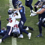 
              Tennessee Titans quarterback Malik Willis (7) celebrates his touchdown against the Houston Texans during the second half of an NFL football game, Saturday, Dec. 24, 2022, in Nashville, Tenn. (AP Photo/John Amis)
            