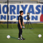 
              Japan's head coach Hajime Moriyasu walks on the pitch prior to Japan official training on the eve of the World Cup round of 16 soccer match between Japan and Croatia at the in Doha, Qatar, Sunday, Dec. 4, 2022. (AP Photo/Eugene Hoshiko)
            