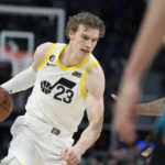 
              Utah Jazz forward Lauri Markkanen (23) drives during the second half of an NBA basketball game against the Detroit Pistons, Tuesday, Dec. 20, 2022, in Detroit. (AP Photo/Carlos Osorio)
            