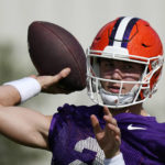 
              Clemson Tigers quarterback Cade Klubnik (2) throws a pass during a practice session ahead of the 2022 Orange Bowl, Wednesday, Dec. 28, 2022, in Fort Lauderdale, Fla. Clemson will face the Tennessee Volunteers in the Orange Bowl on Friday, Dec. 30. (AP Photo/Rebecca Blackwell)
            