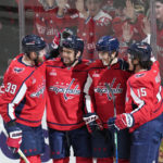 
              Washington Capitals defenseman Trevor van Riemsdyk, third from right, celebrates with right wing Anthony Mantha (39), center Evgeny Kuznetsov, second from left, and left wing Sonny Milano (15) after scoring a goal against the Toronto Maple Leafs during the first period of an NHL hockey game, Saturday, Dec. 17, 2022, in Washington. (AP Photo/Jess Rapfogel)
            