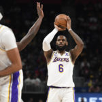 
              Los Angeles Lakers forward LeBron James (6) looks to pass against the Detroit Pistons during the first half of an NBA basketball game, Sunday, Dec. 11, 2022, in Detroit. (AP Photo/Jose Juarez)
            