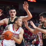 
              Nebraska's C.J. Wilcher is guarded by Purdue's Zach Edey, top left, and Ethan Morton during the first half of an NCAA college basketball game,  Saturday, Dec. 10, 2022, at Pinnacle Bank Arena in Lincoln, Neb. (Kenneth Ferriera/Lincoln Journal Star via AP)
            