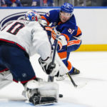 
              New York Islanders' Casey Cizikas (53) attempts to shoot the puck past Columbus Blue Jackets goaltender Joonas Korpisalo (70) during the second period of an NHL hockey game Thursday, Dec. 29, 2022, in Elmont, N.Y. (AP Photo/Frank Franklin II)
            