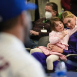
              Kate Upton, and her daughter Genevieve, watch as her husband Justin Verlander participates in a news conference at Citi Field, Tuesday, Dec. 20, 2022, in New York. The team introduced Verlander at a news conference after they agreed to a $86.7 million, two-year contract. It's part of an offseason spending spree in which the Mets have committed $476.7 million on seven free agents. (AP Photo/Seth Wenig)
            