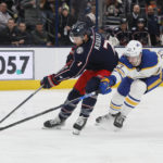 
              Buffalo Sabres' Mattias Samuelsson, right, tries to stop Columbus Blue Jackets' Sean Kuraly on a breakaway during the second period of an NHL hockey game Wednesday, Dec. 7, 2022, in Columbus, Ohio. (AP Photo/Jay LaPrete)
            