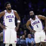
              Philadelphia 76ers' Joel Embiid, left, and James Harden watch a free-throw attempt during the second half of an NBA basketball game against the Toronto Raptors, Monday, Dec. 19, 2022, in Philadelphia. (AP Photo/Matt Slocum)
            