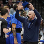 
              Dallas Mavericks coach Jason Kidd, right, questions a call by referee Kevin Scott (24) during the second half of the team's NBA basketball game against the Milwaukee Bucks in Dallas, Friday, Dec. 9, 2022. The Bucks won 106-105. (AP Photo/LM Otero)
            
