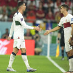
              Portugal's Cristiano Ronaldo, left, leaves the pitch to be substituted by Portugal's Andre Silva, right, during the World Cup group H soccer match between South Korea and Portugal, at the Education City Stadium in Al Rayyan , Qatar, Friday, Dec. 2, 2022. (AP Photo/Francisco Seco)
            