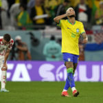 
              Brazil's Neymar celebrates after scoring his side's opening goal besides Croatia's Josip Juranovic during the World Cup quarterfinal soccer match between Croatia and Brazil, at the Education City Stadium in Al Rayyan, Qatar, Friday, Dec. 9, 2022. (AP Photo/Martin Meissner)
            