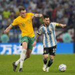 
              Australia's Harry Souttar chases Argentina's Lionel Messi during the World Cup round of 16 soccer match between Argentina and Australia at the Ahmad Bin Ali Stadium in Doha, Qatar, Saturday, Dec. 3, 2022. (AP Photo/Thanassis Stavrakis)
            