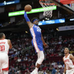 
              Philadelphia 76ers forward Danuel House Jr. (25) drives to the basket during the first half of an NBA basketball game against the Houston Rockets, Monday, Dec. 5, 2022, in Houston. (AP Photo/Eric Christian Smith)
            