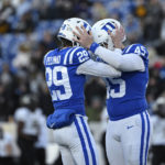 
              Duke place kicker Todd Pelino (29) is greeted by long snapper Evan Deckers (45) after making a field goal during the second half of the Military Bowl NCAA college football game against UCF, Wednesday, Dec. 28, 2022, in Annapolis, Md. (AP Photo/Terrance Williams)
            