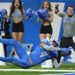 
              Detroit Lions' DJ Chark dives into the end zone for a touchdown reception during the first half of an NFL football game against the Minnesota Vikings Sunday, Dec. 11, 2022, in Detroit. (AP Photo/Paul Sancya)
            