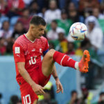 
              Switzerland's Granit Xhaka plays the ball during the World Cup group G soccer match between Switzerland and Cameroon, at the Al Janoub Stadium in Al Wakrah, Qatar, Thursday, Nov. 24, 2022. (AP Photo/Luca Bruno)
            