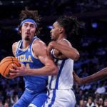 
              UCLA guard Jaime Jaquez Jr. prepares to shoot during the first half of an NCAA college basketball game against Kentucky in the CBS Sports Classic, Saturday, Dec. 17, 2022, in New York. (AP Photo/Julia Nikhinson)
            