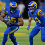 Bobby Wagner #45 of the Los Angeles Rams runs with the ball during the first half of the game against the Denver Broncos at SoFi Stadium on December 25, 2022 in Inglewood, California. (Photo by Jayne Kamin-Oncea/Getty Images)