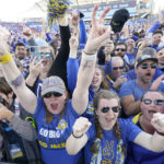 
              CORRECTS TO NORTH DAKOTA STATE NOT NORTH DAKOTA - South Dakota State fans celebrate on the filed after their team defeated North Dakota State to win the FCS Championship NCAA college football game, Sunday, Jan. 8, 2023, in Frisco, Texas. (AP Photo/LM Otero)
            