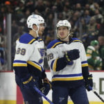 
              St. Louis Blues left wing Pavel Buchnevich (89) talks to center Robert Thomas (18) during the first period of an NHL hockey game against the Minnesota Wild, Sunday, Jan. 8, 2023, in St. Paul, Minn. (AP Photo/Stacy Bengs)
            