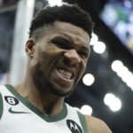 
              Milwaukee Bucks' Giannis Antetokounmpo reacts after making a basket and being fouled during the first half of an NBA basketball game Sunday, Jan. 29, 2023, in Milwaukee. (AP Photo/Morry Gash)
            