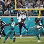 
              Tennessee Titans quarterback Joshua Dobbs (11) passes under pressure from Jacksonville Jaguars linebacker Josh Allen (41) and defensive end Arden Key (49) in the second half of an NFL football game, Saturday, Jan. 7, 2023, in Jacksonville, Fla. (AP Photo/John Raoux)
            