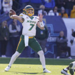 
              CORRECTS TO NORTH DAKOTA STATE NOT NORTH DAKOTA - North Dakota State quarterback Cam Miller (7) drops back to pass during the first half of the FCS Championship NCAA college football game against South Dakota State, Sunday, Jan. 8, 2023, in Frisco, Texas. (AP Photo/LM Otero)
            