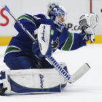
              Vancouver Canucks goalie Collin Delia allows a goal to Colorado Avalanche's Samuel Girard during the second period of an NHL hockey game Thursday, Jan. 5, 2023, in Vancouver, British Columbia. (Darryl Dyck/The Canadian Press via AP)
            