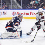 
              Chicago Blackhawks' Andreas Athanasiou (89) is stopped by Edmonton Oilers goalie Jack Campbell (36) during the first period of an NHL hockey game Saturday, Jan. 28, 2023, in Edmonton, Alberta. (Jason Franson/The Canadian Press via AP)
            