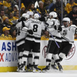 
              Los Angeles Kings celebrate a goal by right wing Adrian Kempe against the Nashville Predators during the second period of an NHL hockey game Saturday, Jan. 21, 2023, in Nashville, Tenn. (AP Photo/Mark Zaleski)
            