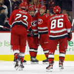 
              Carolina Hurricanes' Paul Stastny, second from right, celebrates after his goal with teammates Seth Jarvis, second from left, Brett Pesce (22) and Teuvo Teravainen (86) during the first period of an NHL hockey game against the Nashville Predators in Raleigh, N.C., Thursday, Jan. 5, 2023. (AP Photo/Karl B DeBlaker)
            