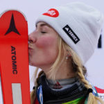 
              United States' Mikaela Shiffrin kisses her skis after winning an alpine ski, women's World Cup slalom, in Spindleruv Mlyn, Czech Republic, Saturday, Jan. 28, 2023. (AP Photo/Piermarco Tacca)
            