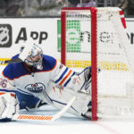 
              Edmonton Oilers goaltender Jack Campbell (36) catches the puck hit by Los Angeles Kings' Adrian Kempe during the second period of an NHL hockey game Monday, Jan. 9, 2023, in Los Angeles. The play was ruled a goal after a video review. (AP Photo/Jae C. Hong)
            