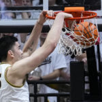 
              Purdue center Zach Edey (15) gets a basket on a dunk against Michigan State during the first half of an NCAA college basketball game in West Lafayette, Ind., Sunday, Jan. 29, 2023. (AP Photo/Michael Conroy)
            