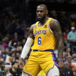 
              Los Angeles Lakers forward LeBron James celebrates after scoring during the first half of an NBA basketball game between the Charlotte Hornets and the Los Angeles Lakers on Monday, Jan. 2, 2023, in Charlotte, N.C. (AP Photo/Chris Carlson)
            