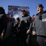 
              Georgia players take the field during a ceremony celebrating the Bulldog's second consecutive NCAA college football national championship, Saturday, Jan. 14, 2023, in Athens, Ga. (AP Photo/Alex Slitz)
            