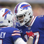 
              Buffalo Bills wide receiver Cole Beasley (11), left, is congratulated by quarterback Josh Allen after his touchdown catch during the second half of an NFL wild-card playoff football game against the Miami Dolphins, Sunday, Jan. 15, 2023, in Orchard Park, N.Y. (AP Photo/Joshua Bessex)
            